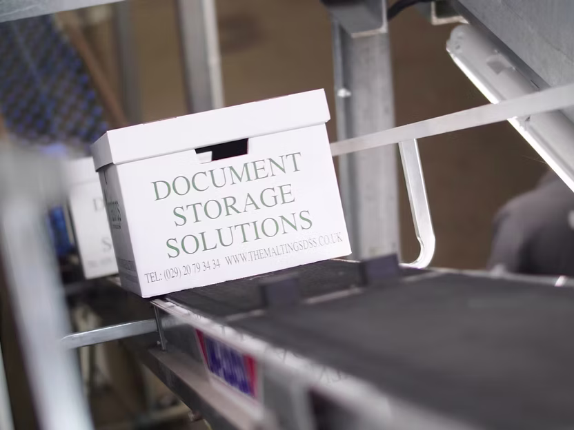 Paper storage box on conveyor belt
